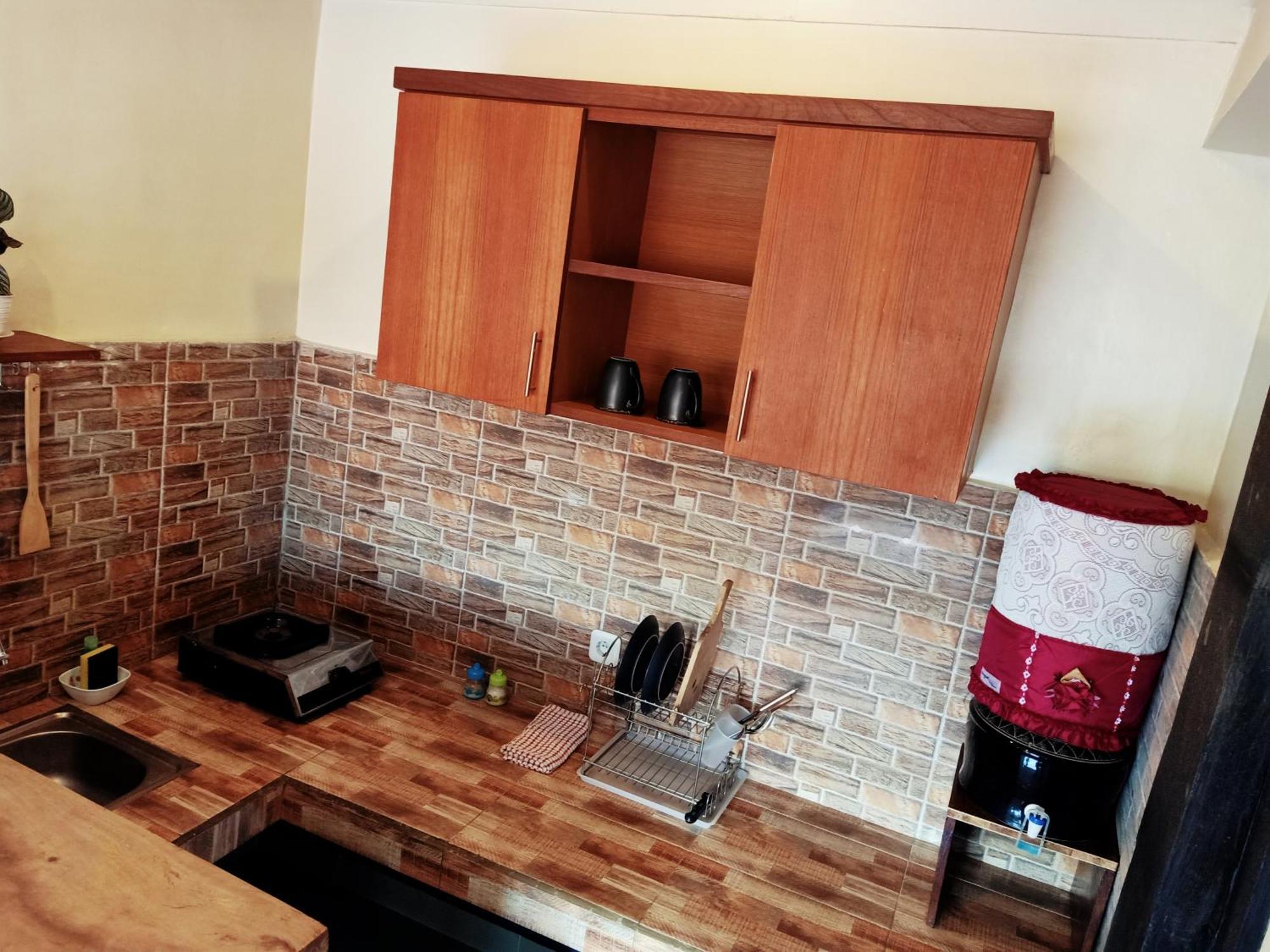Deko House Apartamento Ubud Quarto foto